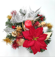 Stroik świąteczny w donicy ze świecą