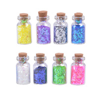 Fiolki z elementami do dekoracji zrób to sam